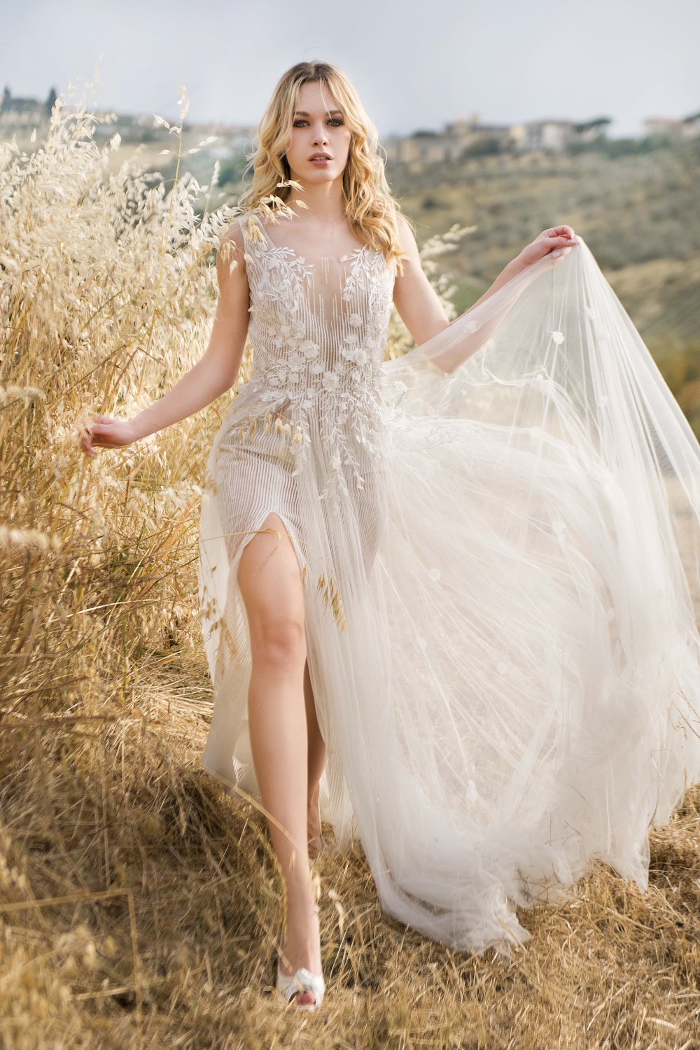 Abito da sposa Magnani Bridal Couture: abito con tulle ricamato effetto cascata glitter - BC 200 